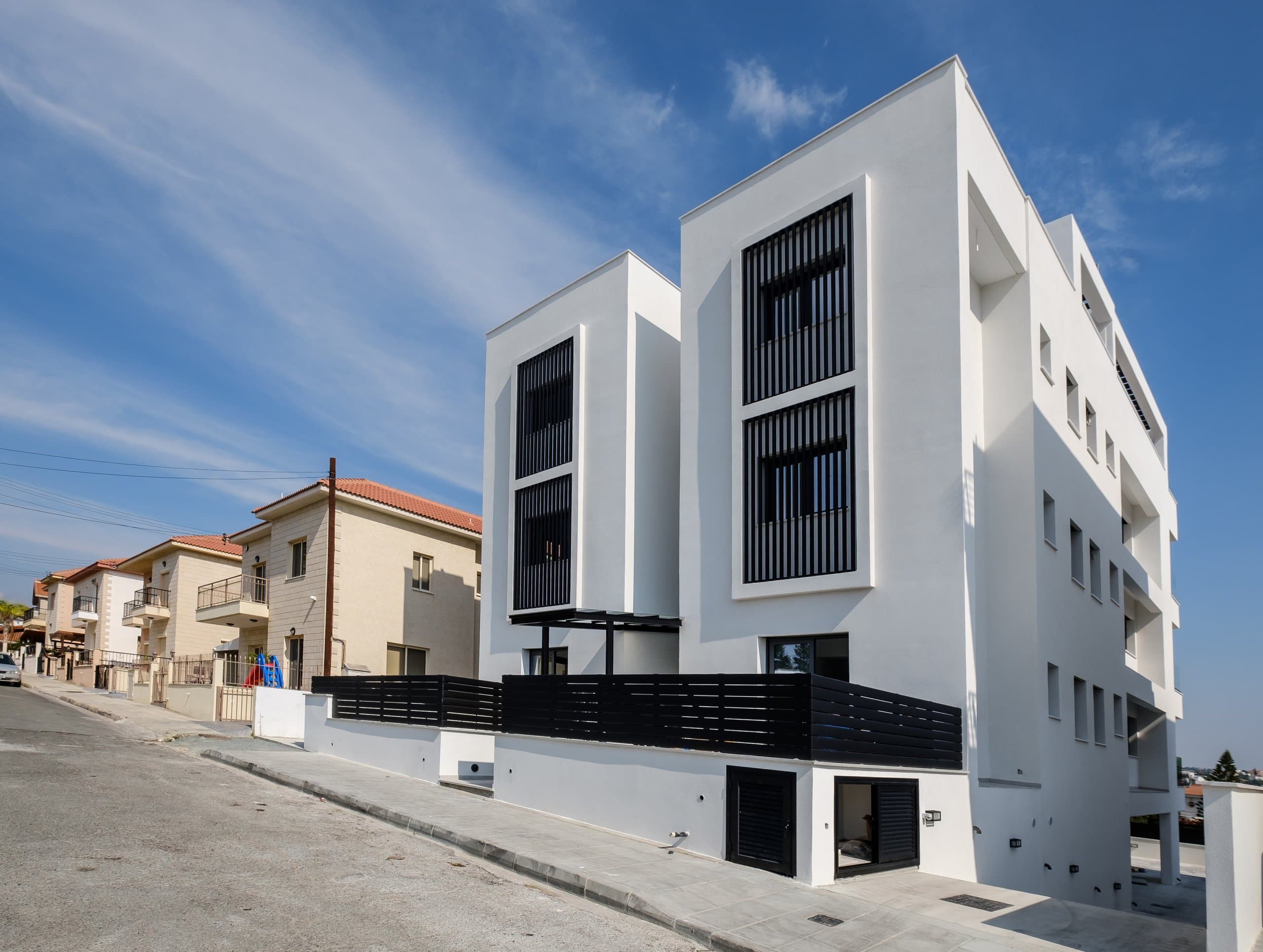 Street view of the completed Simplicity 1 residence in Germasogeia