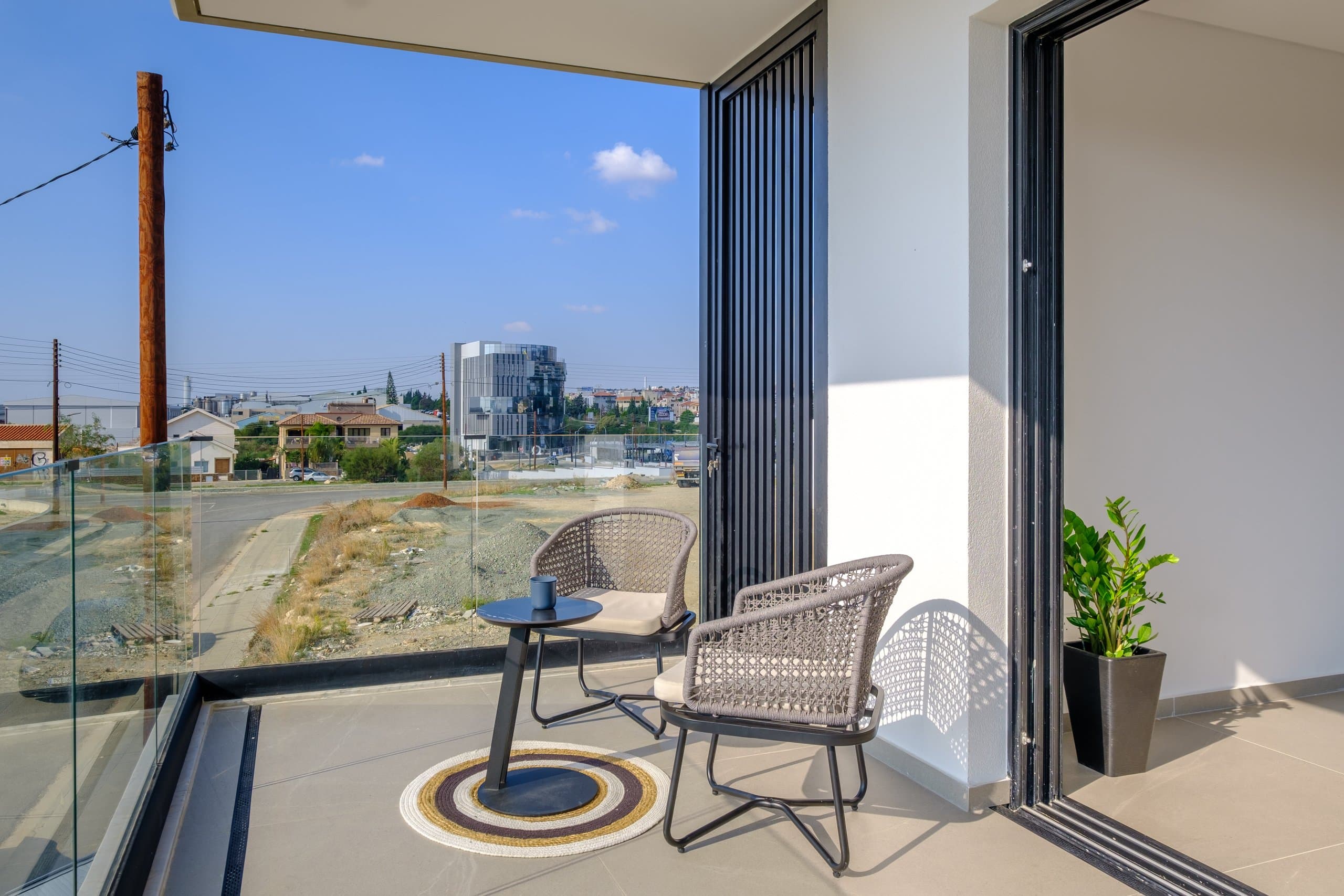 The view from a covered Simplicity 2 balcony across Limassol